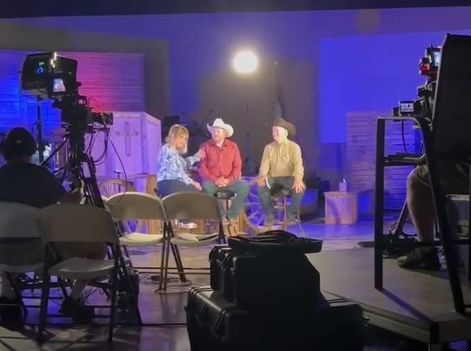 Jeremy Farley on a television set during a guest interview